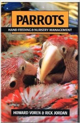 Parrots hand feeding and - hand,